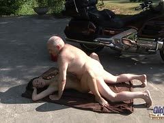 Biker grandpa fucks a young girl outside